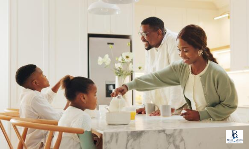 Happy family celebrating a birthday together at the kitchen table